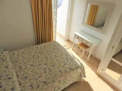 Cama o camas de una habitación en Bungalows Parque Nogal