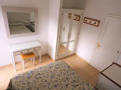 Cama o camas de una habitación en Bungalows Parque Nogal
