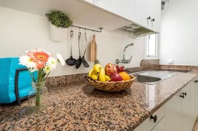 Una cocina o zona de cocina en Apartment Las Canteras Beach