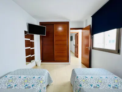 Cama o camas de una habitación en Apartamento Muelle Deportivo