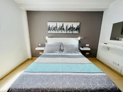 Cama o camas de una habitación en Apartamento Muelle Deportivo