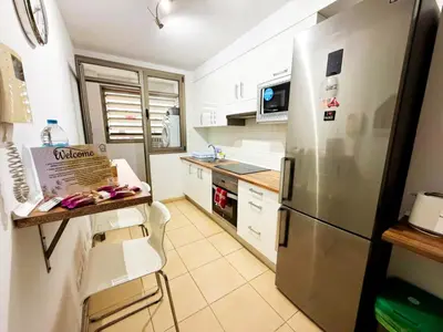 Una cocina o zona de cocina en Apartamento Muelle Deportivo