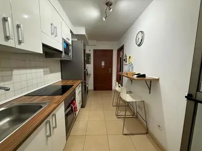 Una cocina o zona de cocina en Apartamento Muelle Deportivo