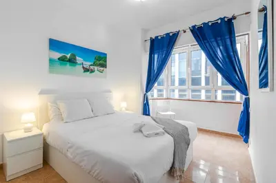 Cama o camas de una habitación en Lovely Flat Santa Catalina Park