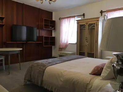 Una televisión o centro de entretenimiento en La Casita de Las Palmas VV