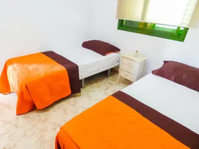 Cama o camas de una habitación en Las Olas Sand