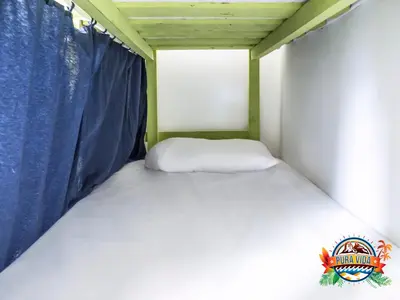Cama o camas de una habitación en Pura Vida Las Palmas
