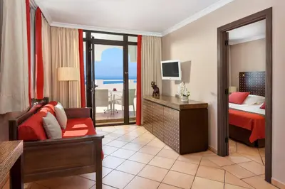 Cama o camas de una habitación en Seaside Sandy Beach