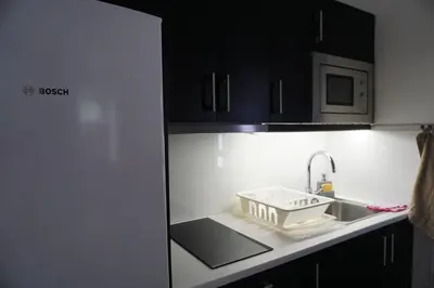 Una cocina o zona de cocina en Apartamento privado en Bahía Feliz