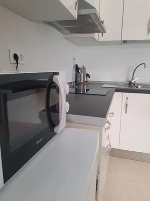 Una cocina o zona de cocina en Apartment la Puntilla del Mar