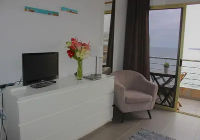 Una televisión o centro de entretenimiento en Galdar GC Vistas al Mar