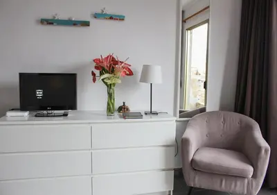 Una televisión o centro de entretenimiento en Galdar GC Vistas al Mar