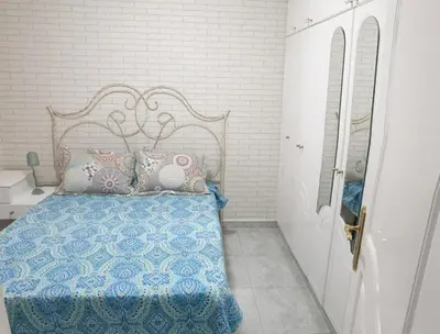 Cama o camas de una habitación en CanariasBrisaMar - Apartamento