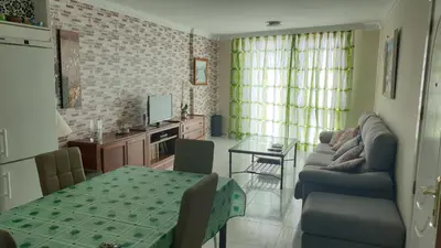 Una televisión o centro de entretenimiento en CanariasBrisaMar - Apartamento