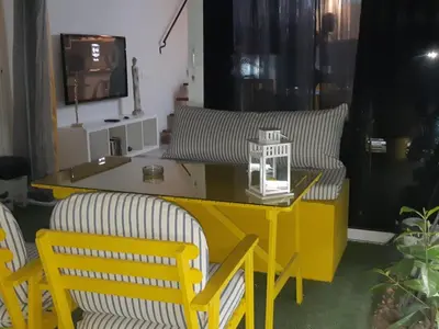 Zona de estar de Pool View Yard Bungalow