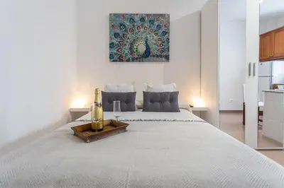 Cama o camas de una habitación en Studio near the Sea and City