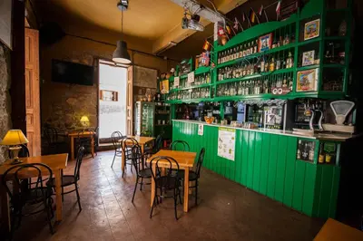 El salón o zona de bar de Casa rural el Burro