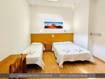 Cama o camas de una habitación en Hotel Kasa