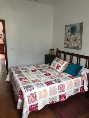 Cama o camas de una habitación en Alojamientos Nicasio