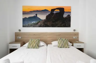 Cama o camas de una habitación en Canteras Suites