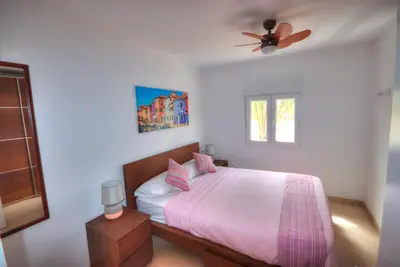 Cama o camas de una habitación en Casa Cocodrilo by CASAS COCODRILO
