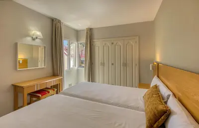 Cama o camas de una habitación en Apartamentos LIVVO Koala Garden