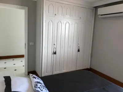 Cama o camas de una habitación en FANTASTICA vivienda en San Agustin con piscina