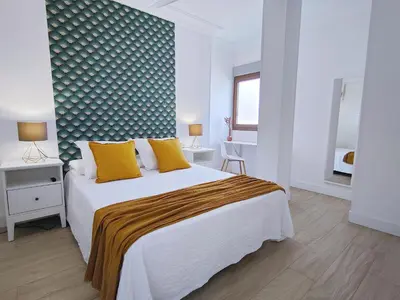 Cama o camas de una habitación en Almeida Deluxe - 200 metres from Las Canteras beach