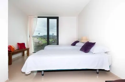 Cama o camas de una habitación en Salobre Villas Deluxe