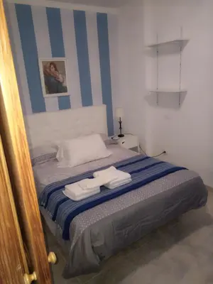 Cama o camas de una habitación en Leps Primera Linea las Canteras