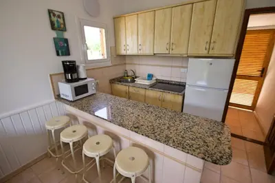 Una cocina o zona de cocina en Precioso Bungalow 11 by CASAS COCODRILO