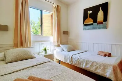 Cama o camas de una habitación en Precioso Bungalow 12 by CASAS COCODRILO
