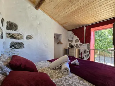 Cama o camas de una habitación en Mountain Hostel&House Finca La Isa by Rose