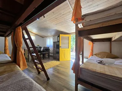 Cama o camas de una habitación en Mountain Hostel&House Finca La Isa by Rose