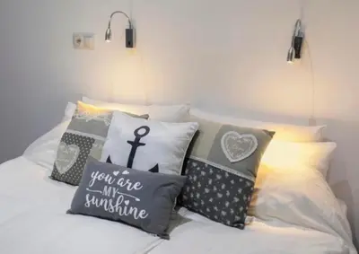 Cama o camas de una habitación en Adorable urban suites