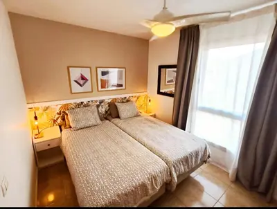 Cama o camas de una habitación en Modern house with 2 bedrooms near the beach
