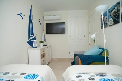 Cama o camas de una habitación en Monte Carrera Little Mermaid