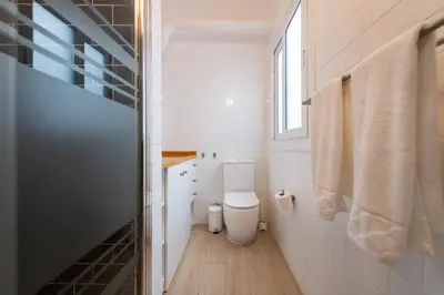 Un baño de City, Sun and Living