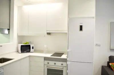Una cocina o zona de cocina en La Grand Suite Las Canteras