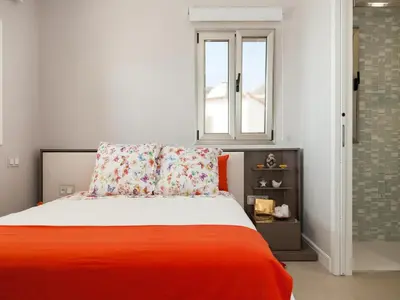 Cama o camas de una habitación en Bungalow Playa del Aguila II over the sea by VillaGranCanaria
