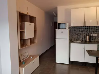 Una cocina o zona de cocina en Modern Apartment