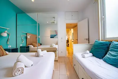 Cama o camas de una habitación en Costa Lairaga Suite. Beachfront! Air conditioned