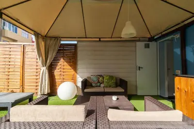 Zona de estar de Costa Lairaga Suite. Beachfront! Air conditioned