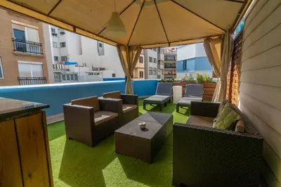Zona de estar de Costa Lairaga Suite. Beachfront! Air conditioned