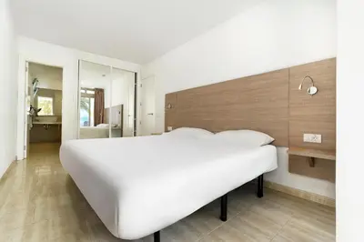Cama o camas de una habitación en Servatur Altamar