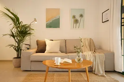 Zona de estar de Maspalomas Suite by 