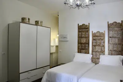 Cama o camas de una habitación en Ciudad Jardín Marina
