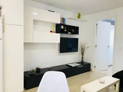 Una televisión o centro de entretenimiento en Appartamento Tata