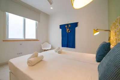 Cama o camas de una habitación en Sahara Suite. Air conditioned.