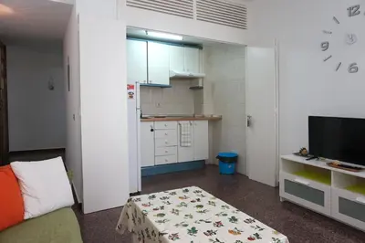 Una cocina o zona de cocina en Mai City Apartment